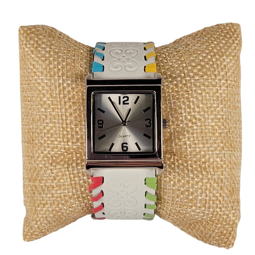Silver Quartz Watch with Embossed Cuff White Leather Strap and Multicolor Design